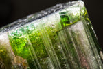 Clear and green tourmaline gemstones.