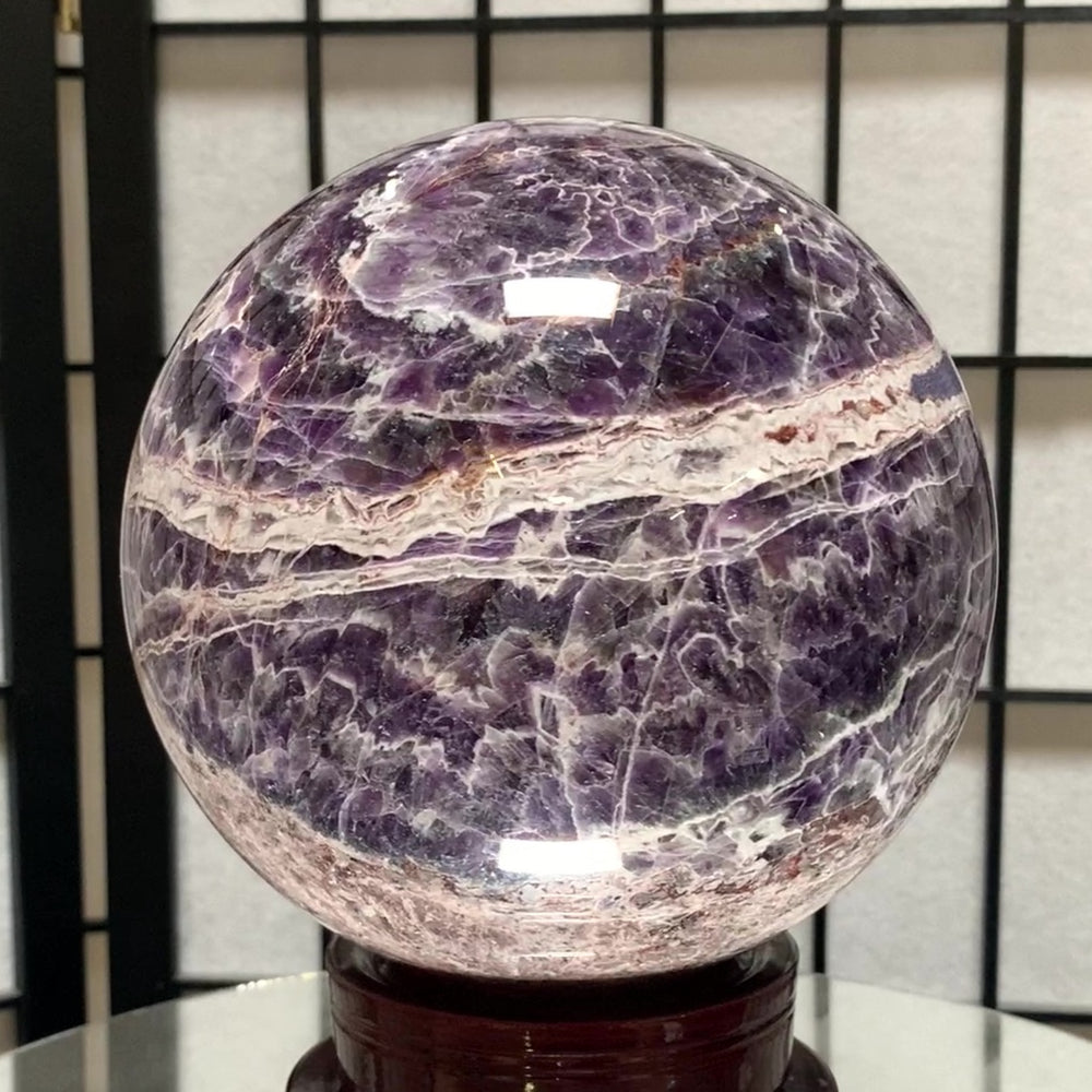 
            
                Load image into Gallery viewer, 17cm 6.39kg Polished Chevron Amethyst Sphere on Stand from Zambia
            
        